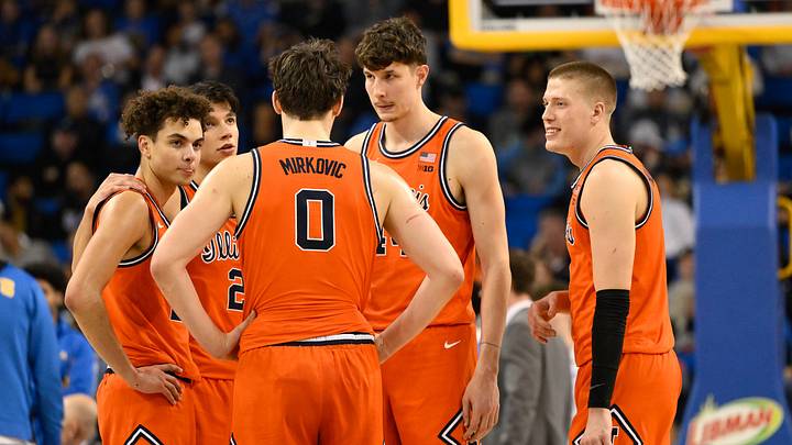 Feb 21, 2026; Los Angeles, California, USA; Illinois players Keaton Wagler (23), Andrej Stojakovic (2), David Mirkovic (0), Zvonimir Ivisic (44) and IBen Humrichous (3) during the 2nd half against the UCLA Bruins at Pauley Pavilion presented by Wescom Financial. Mandatory Credit: Robert Hanashiro-Imagn Images