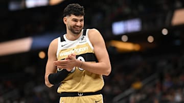 Nov 16, 2025; Washington, District of Columbia, USA;  Washington Wizards forward Tristan Vukcevic (00) smiles after coming in off the bench against the Brooklyn Nets during the fourth quarter at Capital One Arena. Mandatory Credit: Rafael Suanes-Imagn Images