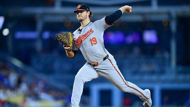 Aug 27, 2024; Los Angeles, California, USA; Baltimore Orioles pitcher Cole Irvin (19) throws against the Los Angeles Dodgers during the second inning at Dodger Stadium.