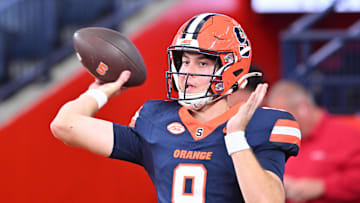 Sep 12, 2025; Syracuse, New York, USA; Syracuse Orange quarterback Steve Angeli (9) warms up before a game against the Colgate Raiders at JMA Wireless Dome. Mandatory Credit: Mark Konezny-Imagn Images