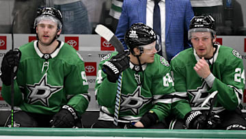 May 3, 2025; Dallas, Texas, USA; Dallas Stars right wing Mikko Rantanen (96) and center Mikael Granlund (64) and center Roope Hintz (24) look on from the team bench as time expires during the third period against the Colorado Avalanche in game seven of the first round of the 2025 Stanley Cup Playoffs at American Airlines Center. Mandatory Credit: Jerome Miron-Imagn Images