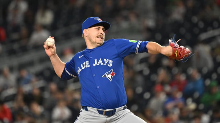 Toronto Blue Jays relief pitcher Erik Swanson (50) throws a pitch against the Washington Nationals during the seventh inning at Nationals Park in 2024.