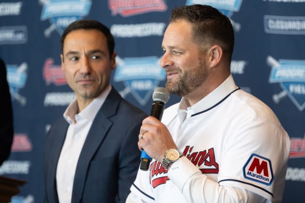 Chris Atnonetti and Stephen Vogt look on at a press conference 