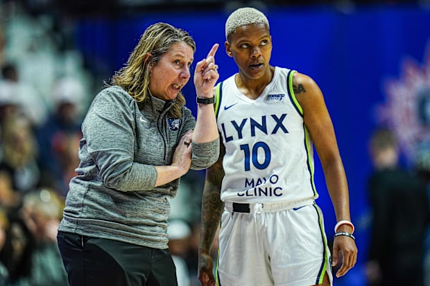Minnesota Lynx coach Cheryl Reeve talks with player Courtney Williams during the semifinals against the Connecticut Sun. 