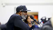 Apr 4, 2025; Boulder, CO, USA; Colorado Buffaloes head coach Deion Sanders speaks to the media at the University of Colorado NFL Showcase at the CU Indoor Practice Facility. Mandatory Credit: Michael Ciaglo-Imagn Images
