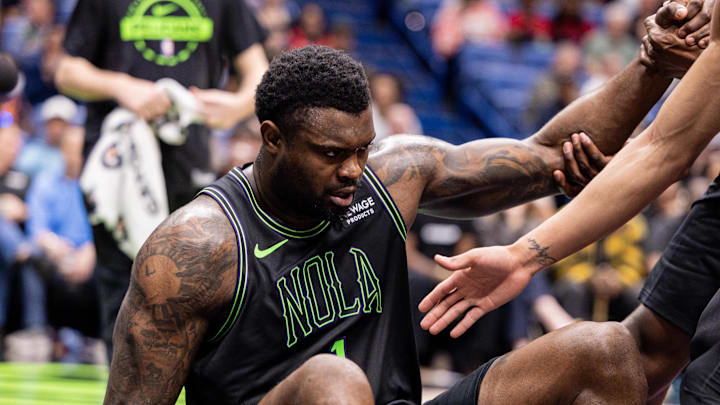 Mar 11, 2026; New Orleans, Louisiana, USA;  New Orleans Pelicans forward Zion Williamson (1) is picked up after a play against the Toronto Raptors during the first half at Smoothie King Center. Mandatory Credit: Stephen Lew-Imagn Images