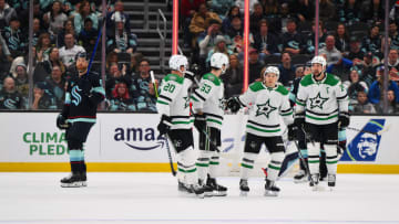 Mar 30, 2024; Seattle, Washington, USA; The Dallas Stars celebrate after a goal scored by center