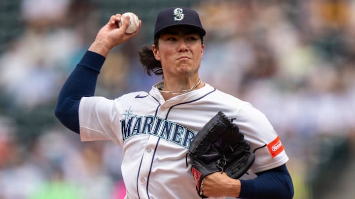 Bryan Woo was left off Seattle's ALDS roster due to a pec injury