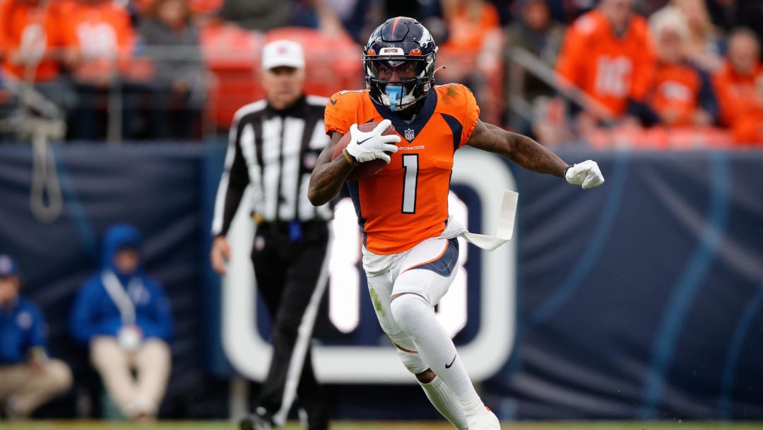 Oct 23, 2022; Denver, Colorado, USA; Denver Broncos wide receiver KJ Hamler (1) runs the ball in the third quarter against the New York Jets at Empower Field at Mile High. Mandatory Credit: Isaiah J. Downing-USA TODAY Sports