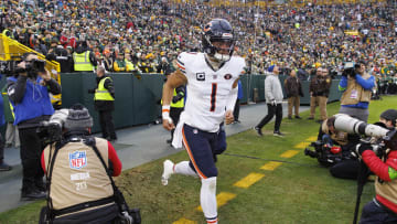 Jan 7, 2024; Green Bay, Wisconsin, USA;  Chicago Bears quarterback Justin Fields (1) runs onto the field prior to the game against the Green Bay Packers at Lambeau Field. Mandatory Credit: Jeff Hanisch-USA TODAY Sports