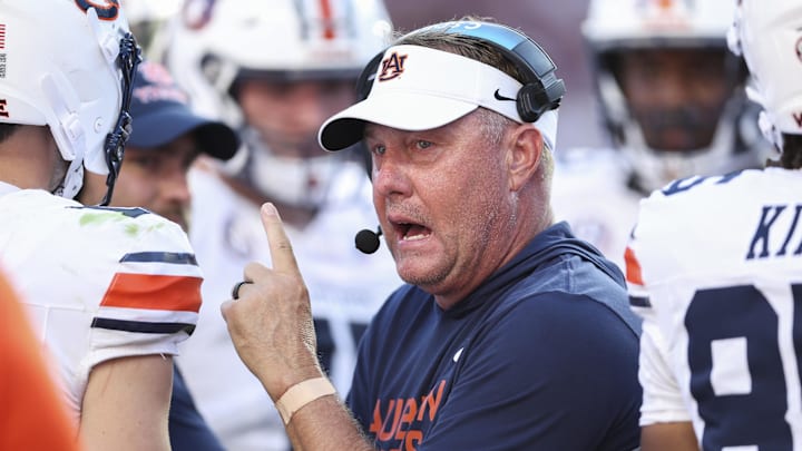Sep 27, 2025; College Station, Texas, USA; Auburn Tigers head coach Hugh Freeze talks with players during the fourth quarter against the Texas A&M Aggies at Kyle Field. Mandatory Credit: Troy Taormina-Imagn Images
