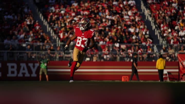 Aug 18, 2024; Santa Clara, California, USA; San Francisco 49ers wide receiver Jacob Cowing (83) runs on the field during a kick return against the New Orleans Saints in the third quarter at Levi's Stadium. Mandatory Credit: Cary Edmondson-USA TODAY Sports