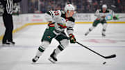 Dec 6, 2024; Anaheim, California, USA; Minnesota Wild center Marco Rossi (23) moves the puck against the Anaheim Ducks during the first period at Honda Center. Mandatory Credit: Gary A. Vasquez-Imagn Images