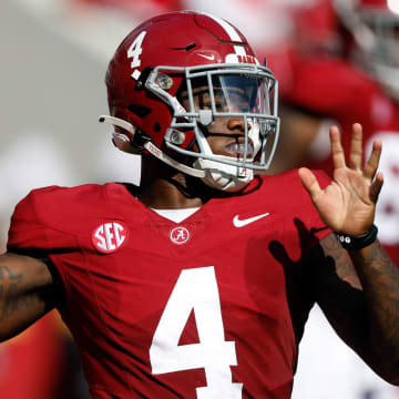 Sep 23, 2023; Tuscaloosa, Alabama, USA;  Alabama Crimson Tide quarterback Jalen Milroe (4) throws a pass against the Mississippi Rebels during the first half at Bryant-Denny Stadium. Mandatory Credit: Butch Dill-USA TODAY Sports