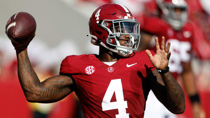 Sep 23, 2023; Tuscaloosa, Alabama, USA;  Alabama Crimson Tide quarterback Jalen Milroe (4) throws a pass against the Mississippi Rebels during the first half at Bryant-Denny Stadium. Mandatory Credit: Butch Dill-USA TODAY Sports