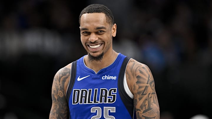 Mar 21, 2025; Dallas, Texas, USA; Dallas Mavericks forward P.J. Washington (25) smiles for the fans during the second half of the game against the Detroit Pistons at the American Airlines Center. Mandatory Credit: Jerome Miron-Imagn Images
