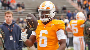 Tennessee running back Dylan Sampson (6) tosses a ball during warm-ups before a NCAA football game between Tennessee and UTEP in Neyland Stadium on Saturday, November 23, 2024.