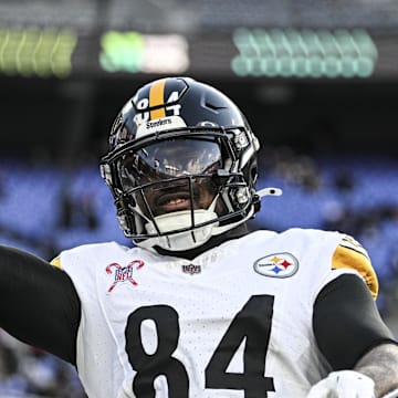 Dec 21, 2024; Baltimore, Maryland, USA;  Pittsburgh Steelers running back Cordarrelle Patterson (84) throws the ball to fans before the game against the Baltimore Ravens at M&T Bank Stadium. Mandatory Credit: Tommy Gilligan-Imagn Images
