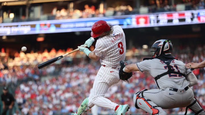 Aug 27, 2024; Philadelphia, Pennsylvania, USA; Philadelphia Phillies first base Bryce Harper (3) hits a single during the first inning against the Houston Astros at Citizens Bank Park. 