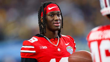 Dec 29, 2023; Arlington, TX, USA;  Ohio State Buckeyes wide receiver Marvin Harrison Jr. (18) looks