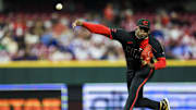 May 23, 2025; Cincinnati, Ohio, USA; Cincinnati Reds relief pitcher Luis Mey (62) pitches against the Chicago Cubs in the ninth inning at Great American Ball Park. Mandatory Credit: Katie Stratman-Imagn Images