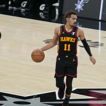 Nov 30, 2023; San Antonio, Texas, USA;  Atlanta Hawks guard Trae Young (11) dribbles the ball in the first half against the San Antonio Spurs at the Frost Bank Center. Mandatory Credit: Daniel Dunn-USA TODAY Sports