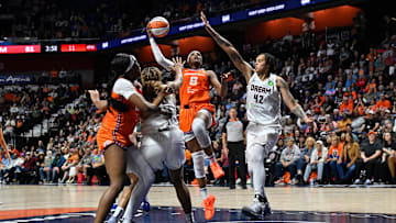 Atlanta Dream center Brittney Griner (42) defends against Connecticut Sun forward Aaliyah Edwards (8) during the second half at Mohegan Sun Arena. 