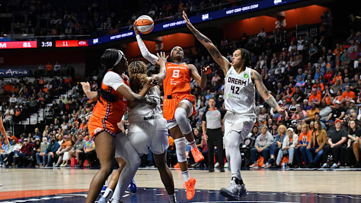 Atlanta Dream center Brittney Griner (42) defends against Connecticut Sun forward Aaliyah Edwards (8) during the second half at Mohegan Sun Arena. 