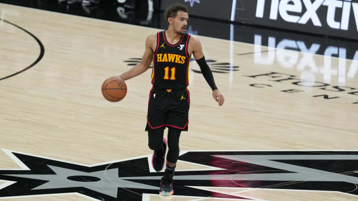 Nov 30, 2023; San Antonio, Texas, USA; Atlanta Hawks guard Trae Young (11) dribbles the ball in the first half against the San Antonio Spurs at the Frost Bank Center. 