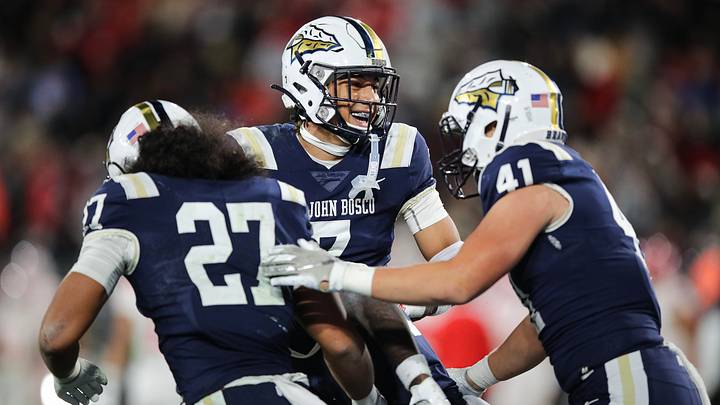 At the 2022 Section Championship No. 41 Dutch Horisk celebrates a big play with teammate No. 27 Peyton Woodyard, who is already with the Ducks as a hard-hitting safety. 
