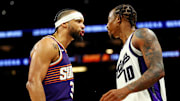 Oct 22, 2025; Phoenix, Arizona, USA; Phoenix Suns forward Dillon Brooks (3) and Sacramento Kings guard DeMar DeRozan (10) exchange words during the second half at the Mortgage Matchup Center. Mandatory Credit: Mark J. Rebilas-Imagn Images