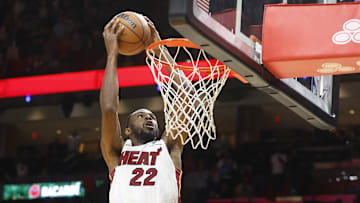 Nov 10, 2025; Miami, Florida, USA;  Miami Heat forward Andrew Wiggins (22) dunks against the Cleveland Cavaliers during overtime at Kaseya Center. Mandatory Credit: Rhona Wise-Imagn Images