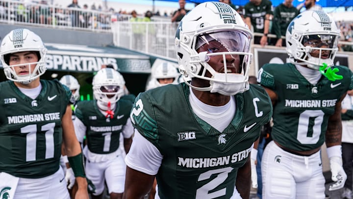 Michigan State quarterback Aidan Chiles (2) leads a group out for warm up against Western Michigan at Spartan Stadium in East Lansing on Friday, August 29, 2025.