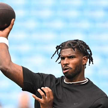 Aug 8, 2025; Charlotte, North Carolina, USA;  Cleveland Browns quarterback Shedeur Sanders (12) before the game at Bank of America Stadium. Mandatory Credit: Bob Donnan-Imagn Images