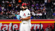 Sep 2, 2025; Phoenix, Arizona, USA; Arizona Diamondbacks pitcher Nabil Crismatt (61) pitches in the first inning of the game between Arizona Diamondbacks and Texas Rangers at Chase Field. Mandatory Credit: Arianna Grainey-Imagn Images