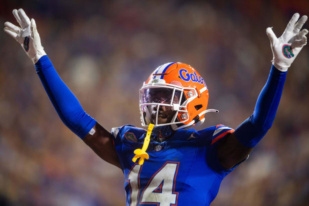 Florida safety Jordan Castell (14) celebrates after making a play during a football game between Tennessee and Florida.