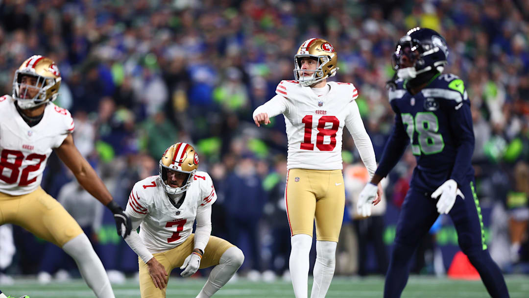 Jan 17, 2026; Seattle, WA, USA; San Francisco 49ers place kicker Eddy Pineiro (18) watches his made field goal against the Seattle Seahawks during the first half in an NFC Divisional Round game at Lumen Field. Mandatory Credit: Kevin Ng-Imagn Images