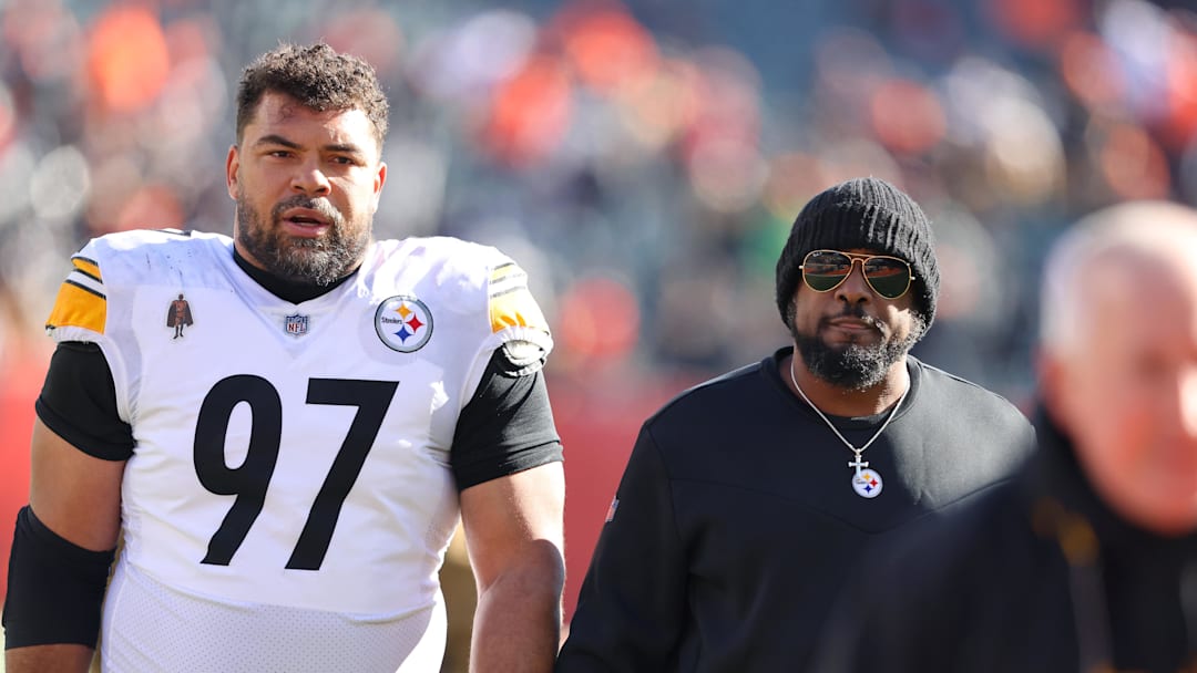 Dec 1, 2024; Cincinnati, Ohio, USA; Pittsburgh Steelers defensive tackle Cameron Heyward (97) and head coach Mike Tomlin before the game against the Cincinnati Bengals at Paycor Stadium. Mandatory Credit: Joseph Maiorana-Imagn Images Dec 1, 2024; Cincinnati, Ohio, USA; Pittsburgh Steelers defensive tackle Cameron Heyward (97) and head coach Mike Tomlin before the game against the Cincinnati Bengals at Paycor Stadium. Mandatory Credit: Joseph Maiorana-Imagn Images