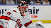 Feb 25, 2024; Buffalo, New York, USA;  Carolina Hurricanes goaltender Spencer Martin (41) looks to make a save during the second period against the Buffalo Sabres at KeyBank Center. Mandatory Credit: Timothy T. Ludwig-Imagn Images