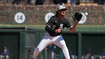 Mar 8, 2025; Phoenix, Arizona, USA; Chicago White Sox third base Josh Rojas (5) makes the play for an out against the Los Angeles Dodgers in the fourth inning at Camelback Ranch-Glendale. Mandatory Credit: Rick Scuteri-Imagn Images