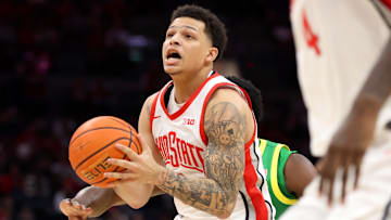 Jan 9, 2025; Columbus, Ohio, USA;  Ohio State Buckeyes guard John Mobley Jr. (0) looks for a shot during the second half against the Oregon Ducks at Value City Arena. Mandatory Credit: Joseph Maiorana-Imagn Images