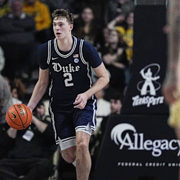 Jan 25, 2025; Winston-Salem, North Carolina, USA; Duke Blue Devils guard Cooper Flagg (2) brings the ball up court against the Wake Forest Demon Deacons during the second half at Lawrence Joel Veterans Memorial Coliseum. Mandatory Credit: Jim Dedmon-Imagn Images