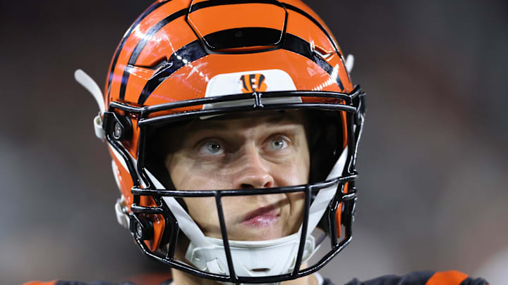 Sep 23, 2024; Cincinnati, Ohio, USA; Cincinnati Bengals quarterback Joe Burrow (9) reacts as he looks at the scoreboard during the fourth quarter against the Washington Commanders at Paycor Stadium. Mandatory Credit: Joseph Maiorana-Imagn Images