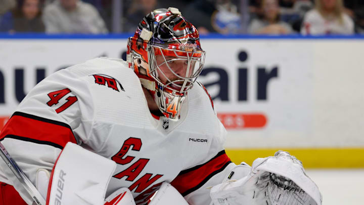 Feb 25, 2024; Buffalo, New York, USA;  Carolina Hurricanes goaltender Spencer Martin (41) looks to make a save during the second period against the Buffalo Sabres at KeyBank Center. Mandatory Credit: Timothy T. Ludwig-Imagn Images