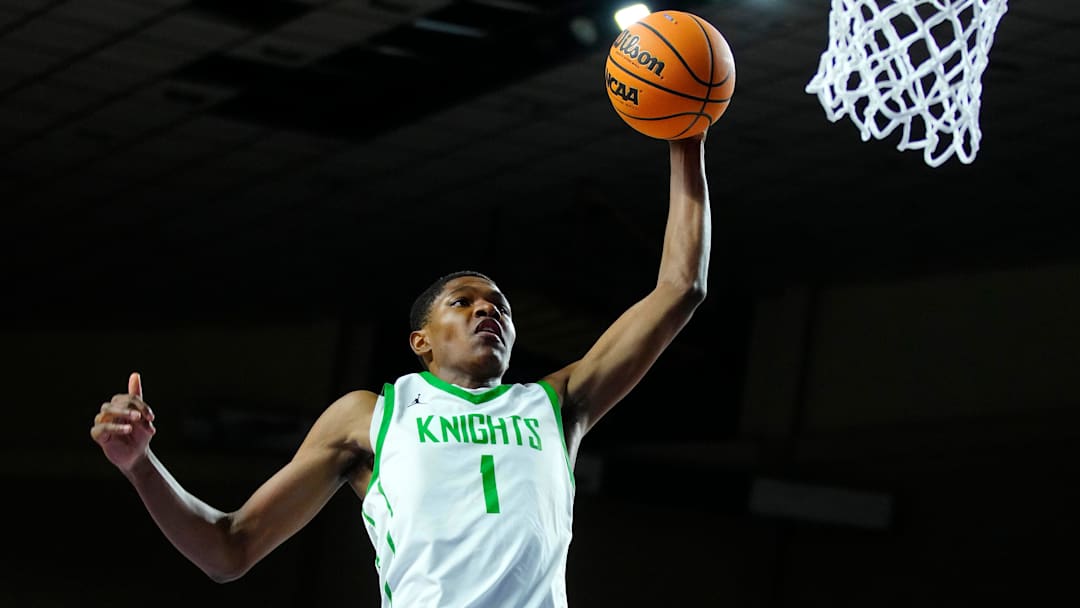 St. Mary’s forward Cameron Williams (1) dunks against Deer Valley during the 4A State Championship at Veterans Memorial Coliseum in Phoenix on March 6, 2025.