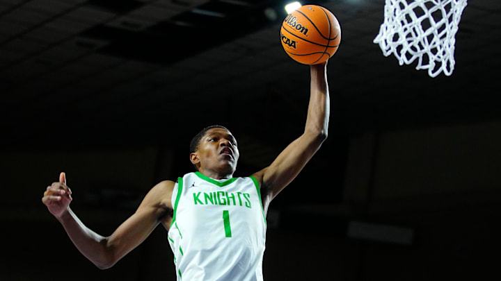 St. Mary’s forward Cameron Williams (1) dunks against Deer Valley during the 4A State Championship at Veterans Memorial Coliseum in Phoenix on March 6, 2025.
