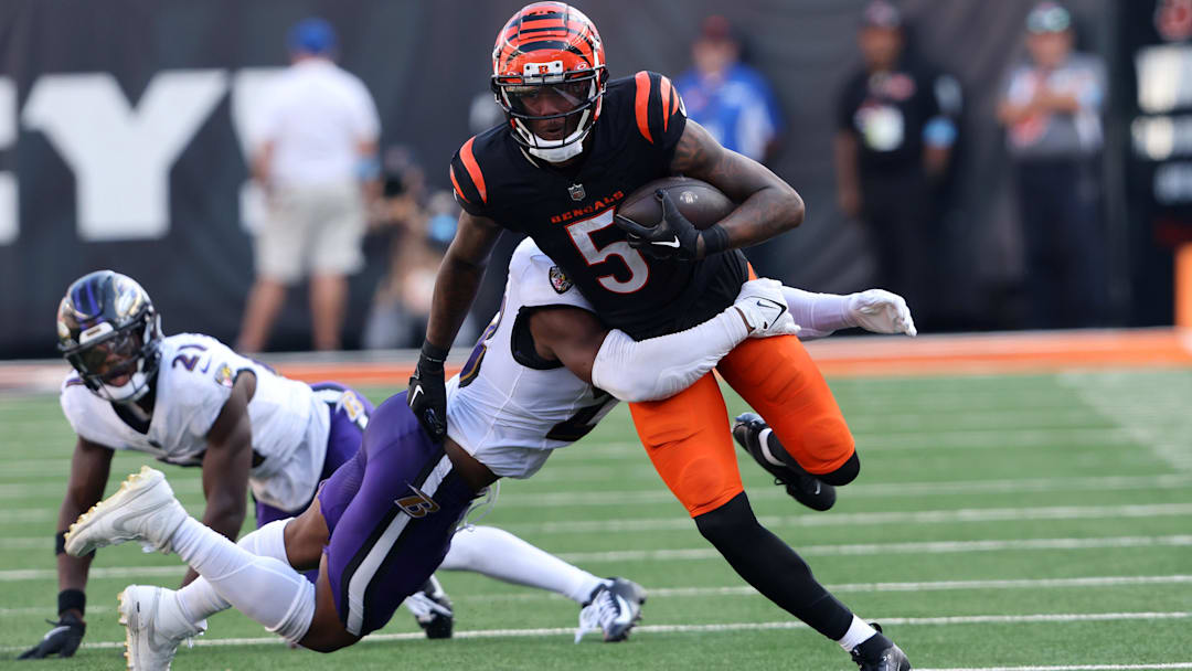 Oct 6, 2024; Cincinnati, Ohio, USA; Cincinnati Bengals wide receiver Tee Higgins (5) runs after making a catch during the second half against the Baltimore Ravens at Paycor Stadium. Mandatory Credit: Joseph Maiorana-Imagn Images