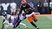 Oct 6, 2024; Cincinnati, Ohio, USA; Cincinnati Bengals wide receiver Tee Higgins (5) runs after making a catch during the second half against the Baltimore Ravens at Paycor Stadium. Mandatory Credit: Joseph Maiorana-Imagn Images