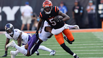Oct 6, 2024; Cincinnati, Ohio, USA; Cincinnati Bengals wide receiver Tee Higgins (5) runs after making a catch during the second half against the Baltimore Ravens at Paycor Stadium. Mandatory Credit: Joseph Maiorana-Imagn Images