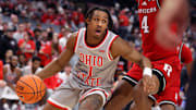 Dec 7, 2024; Columbus, Ohio, USA;  Ohio State Buckeyes guard Meechie Johnson Jr. (1) controls the ball as Rutgers Scarlet Knights guard Ace Bailey (4) defends during the second half at Value City Arena. Mandatory Credit: Joseph Maiorana-Imagn Images